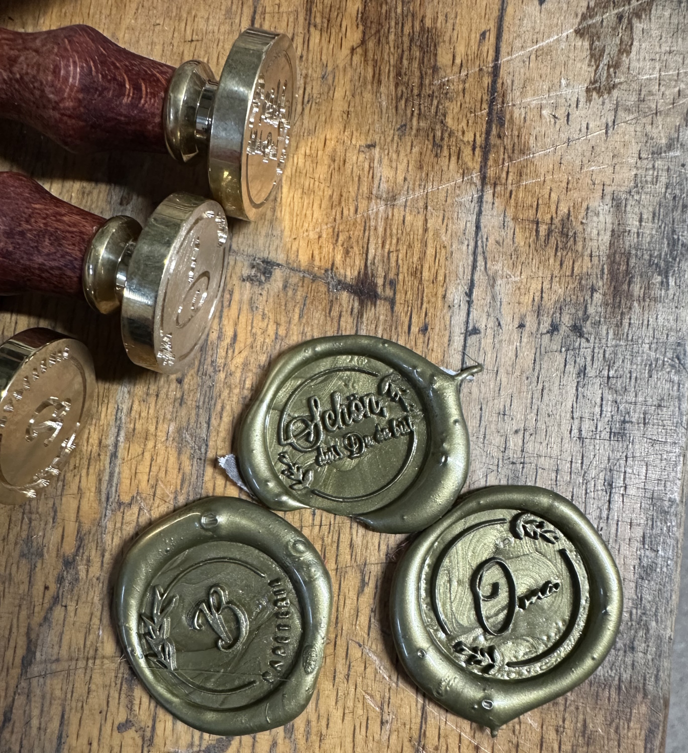 We continued with brass. After some wax seal stamps were created using engraving cutters, unfortunately one design went a bit wrong and was not completely centered.